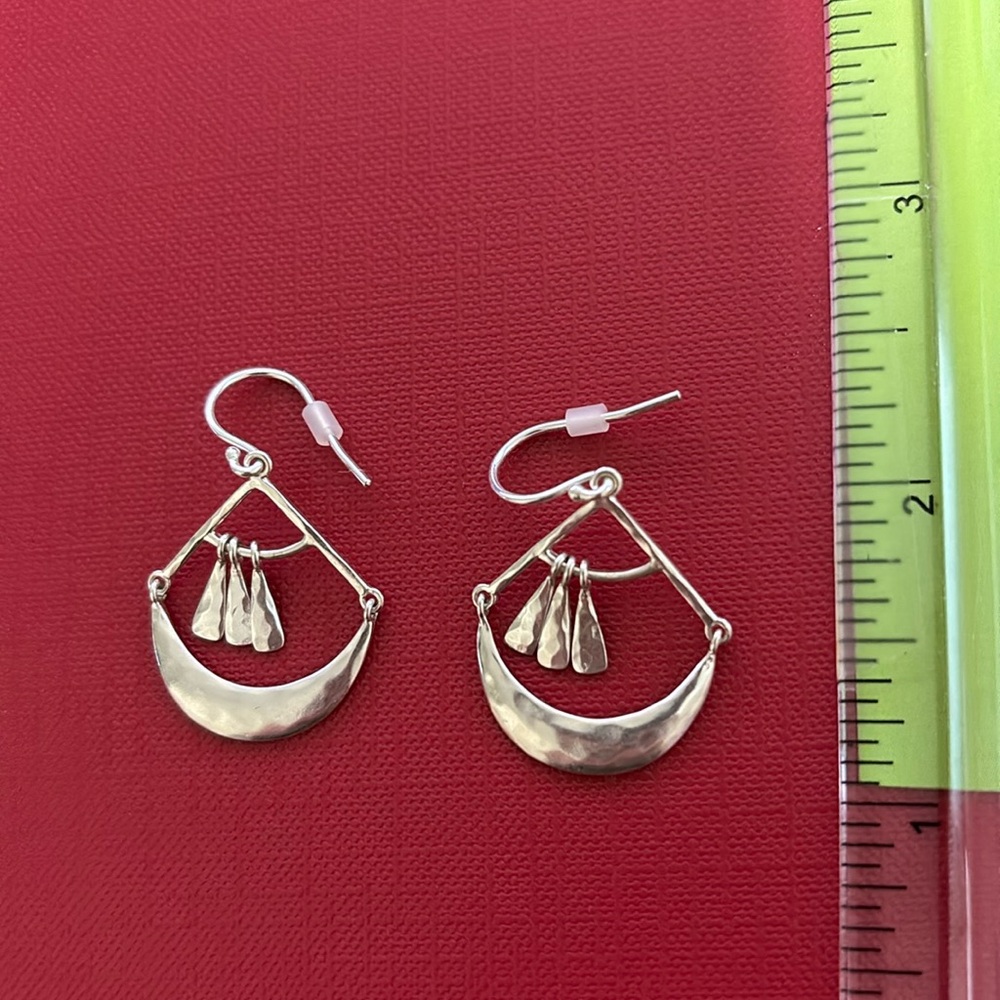 Silver contemporary dangle earrings.